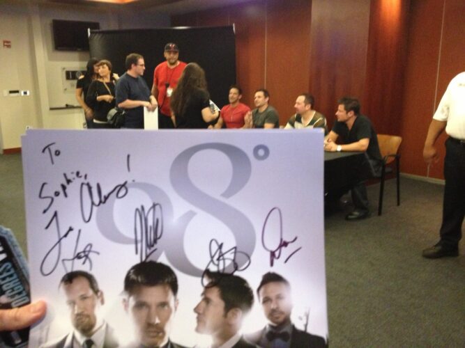 After meeting the band, giving them Sophie's note and now waiting for a pic with them!